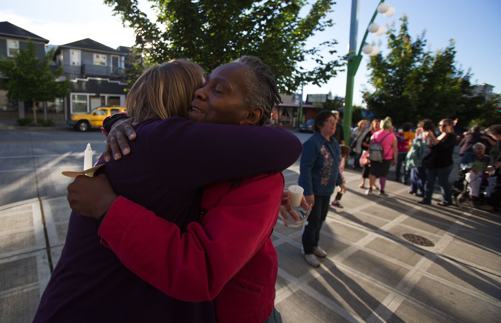 Amman Wilson hugs each of the 17 people who walked in memory of the victims of the Orlando, Florida, shootings on Wednesday through downtown Everett.
