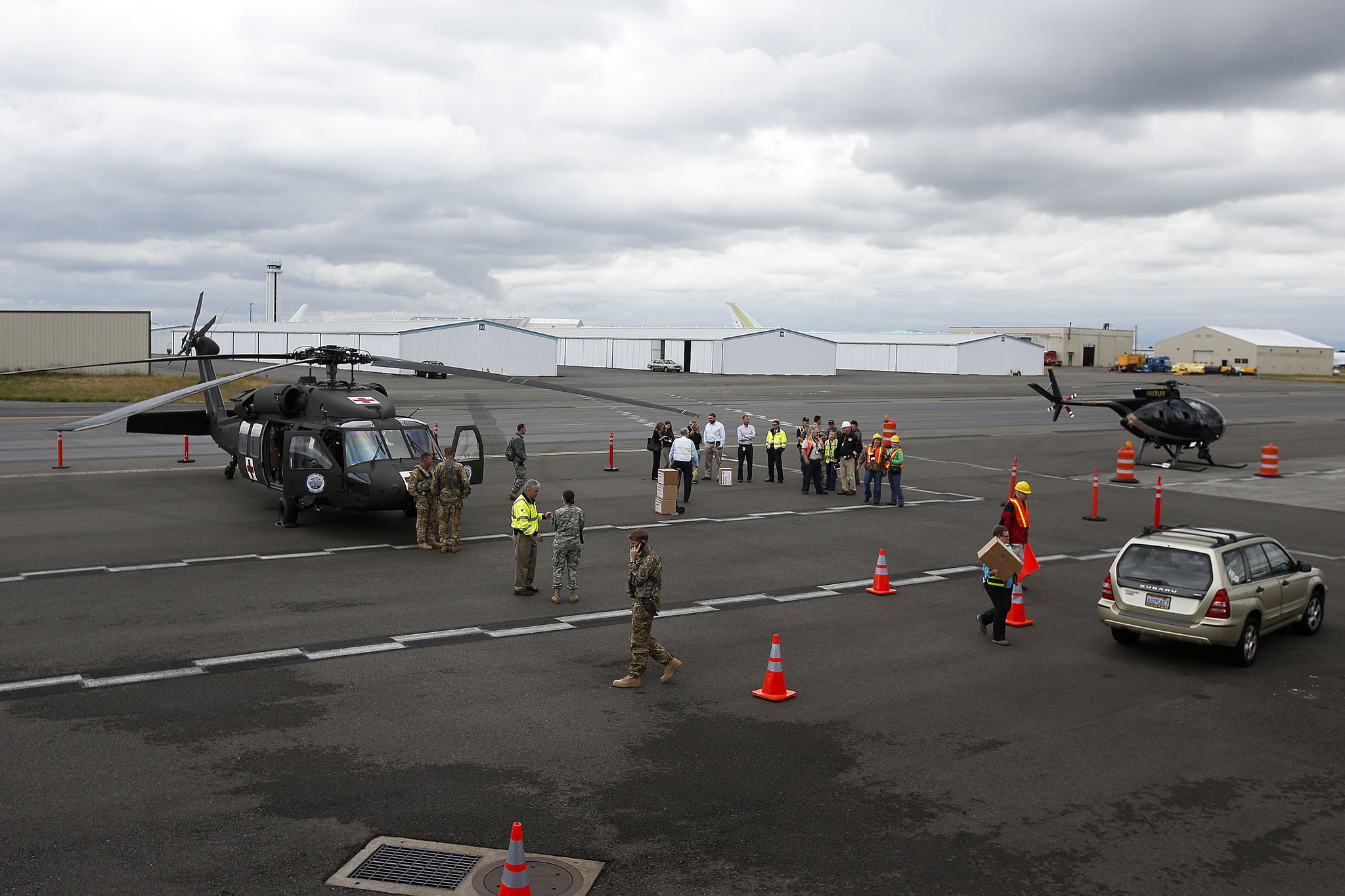 A Washington Army National Guard UH-60 Blackhawk helicopter sits at Paine Field during an earthquake exercise on Thursday.