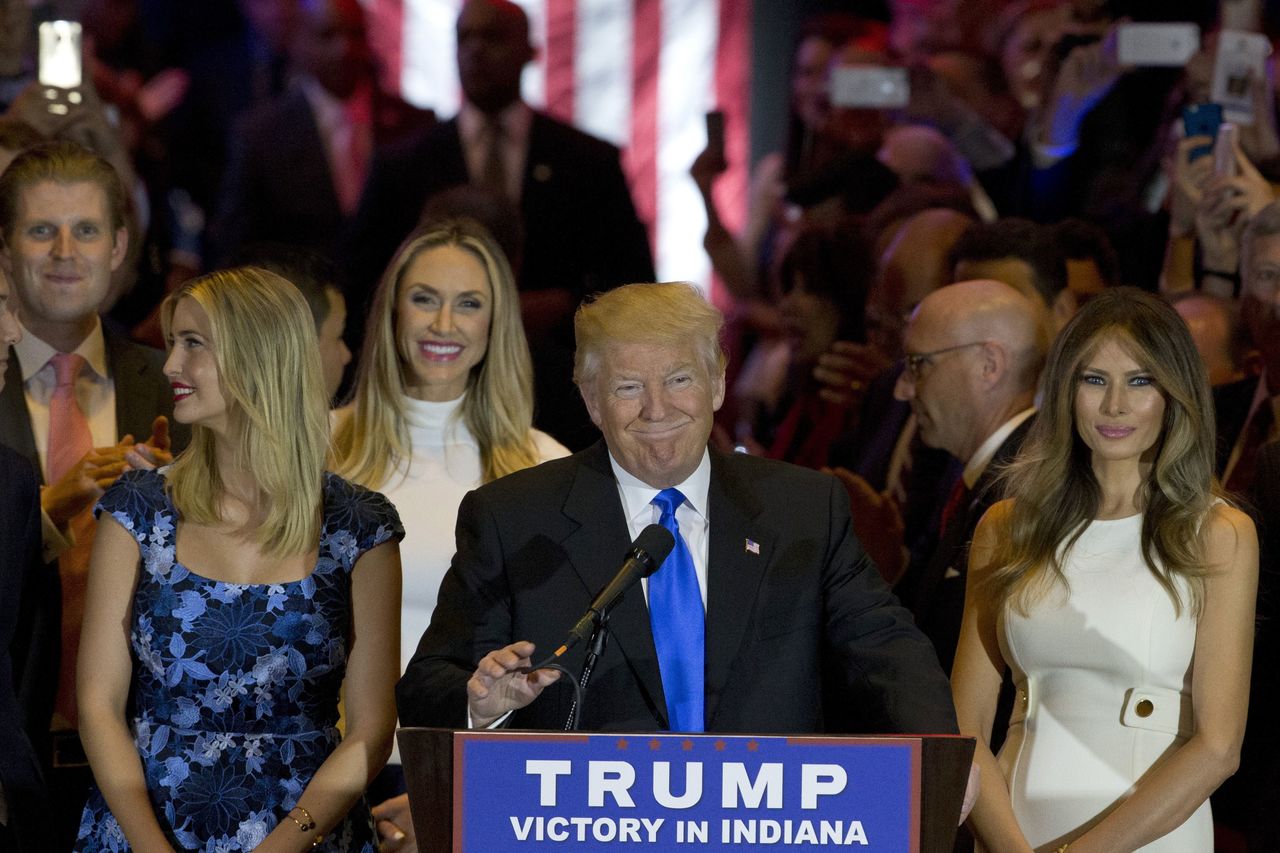 Republican presidential candidate Donald Trump is joined by his wife, Melania, and daughter, Ivanka, as he arrives for a primary night news conference on Tuesday in New York.