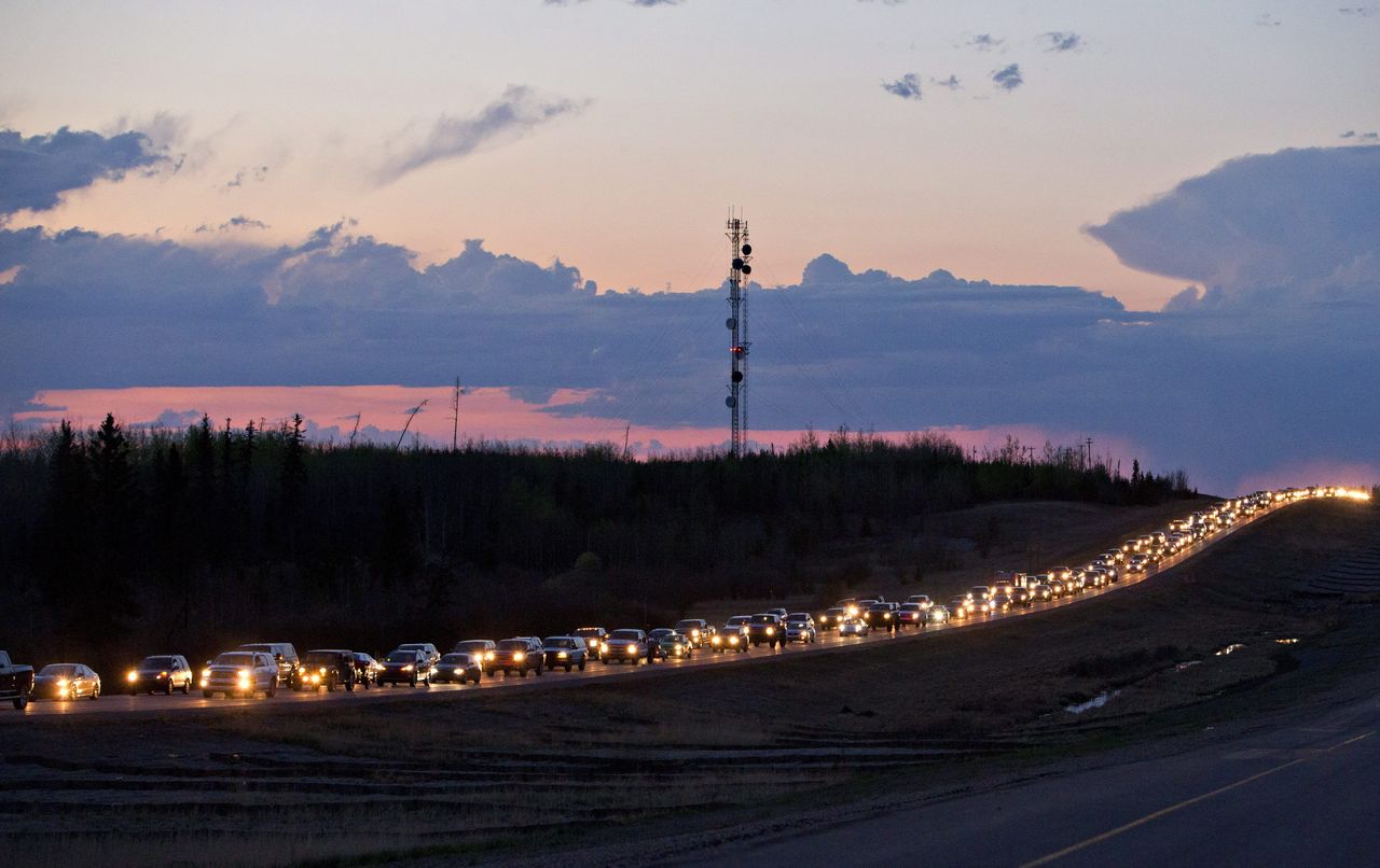 Traffic lines the highway as residents leave Fort McMurray, Alberta, Canada, on Tuesday.
