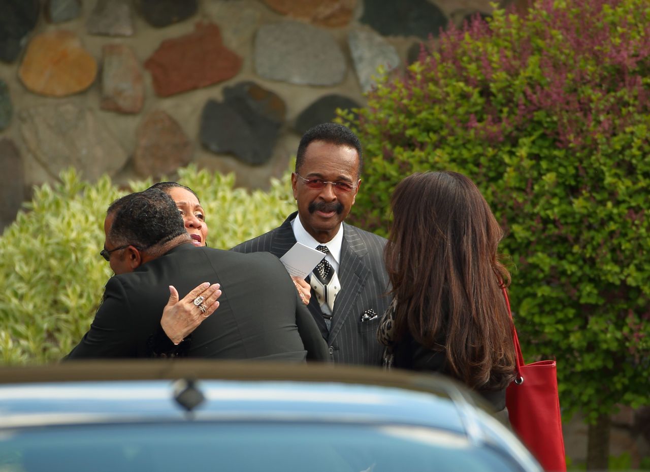 Larry Graham, center, arrives at a Jehovah’s Witnesses Kingdom Hall for a memorial service for Prince on Sunday in Minnetonka, Minn. Graham, the former Sly and the Family Stone bassist, was Prince’s spiritual mentor.