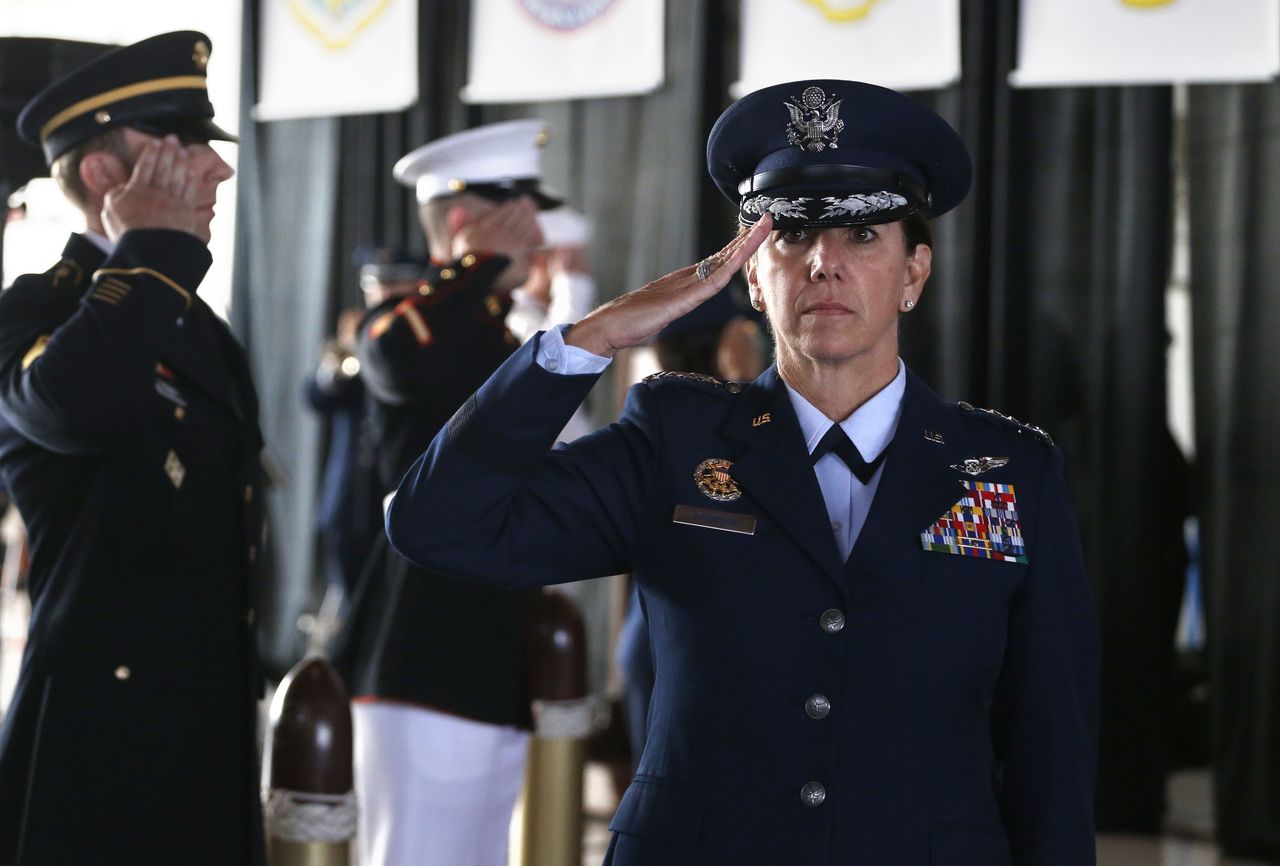 Air Force Gen. Lori J. Robinson, the incoming commander of the North American Aerospace Defense Command and U.S. Northern Command, salutes during her arrival at the change of command ceremony, at Peterson Air Force Base, in Colorado Springs, Colo., Friday, May 13, 2016. Gen. Robinson is the first woman to lead a top-tier U.S. military command after taking charge Friday at NORAD and USNORTHCOM. (AP Photo/Brennan Linsley)