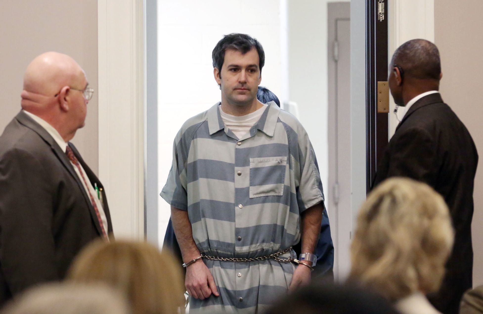 Former North Charleston police office Michael Slager is led into court in Charleston, South Carolina, on Sept. 10, 2015.