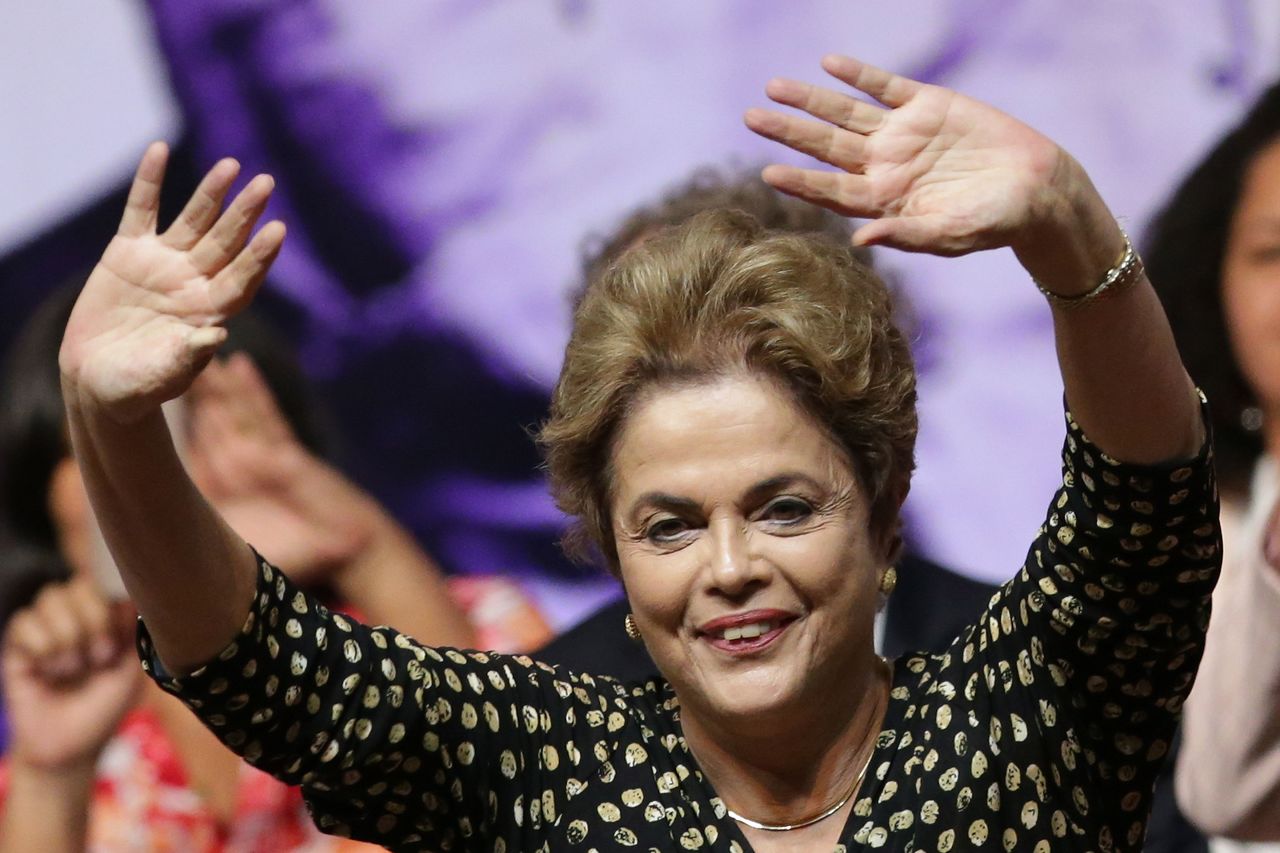 Brazil’s President Dilma Rousseff waves during opening of the National Conference of Women in Brasilia, Brazil, on Tuesday.