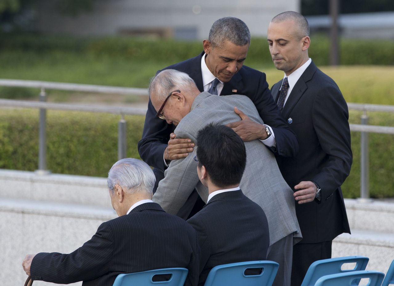 President Barack Obama hugs Shigeaki Mori, an atomic bombing survivor, during a ceremony at Hiroshima Peace Memorial Park in Hiroshima, Japan, on Friday.