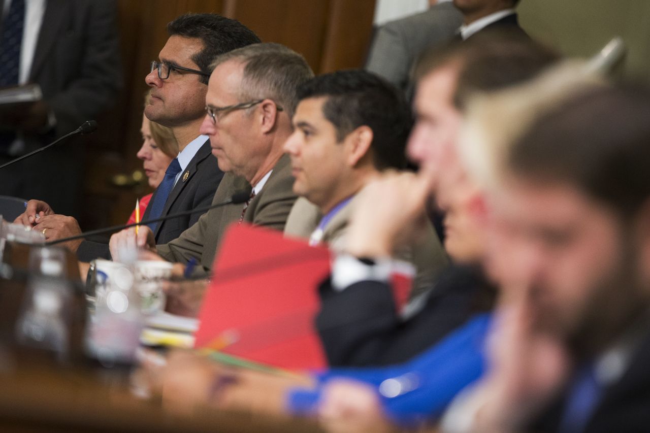 Puerto Rico’s Resident Commissioner Pedro Pierluisi, D-Puerto Rico (second from left), listens on Capitol Hill in Washington on Wednesday during a House Natural Resources Committee markup hearing on H.R. 5278, Puerto Rico Oversight, Management, and Economic Stability Act.
