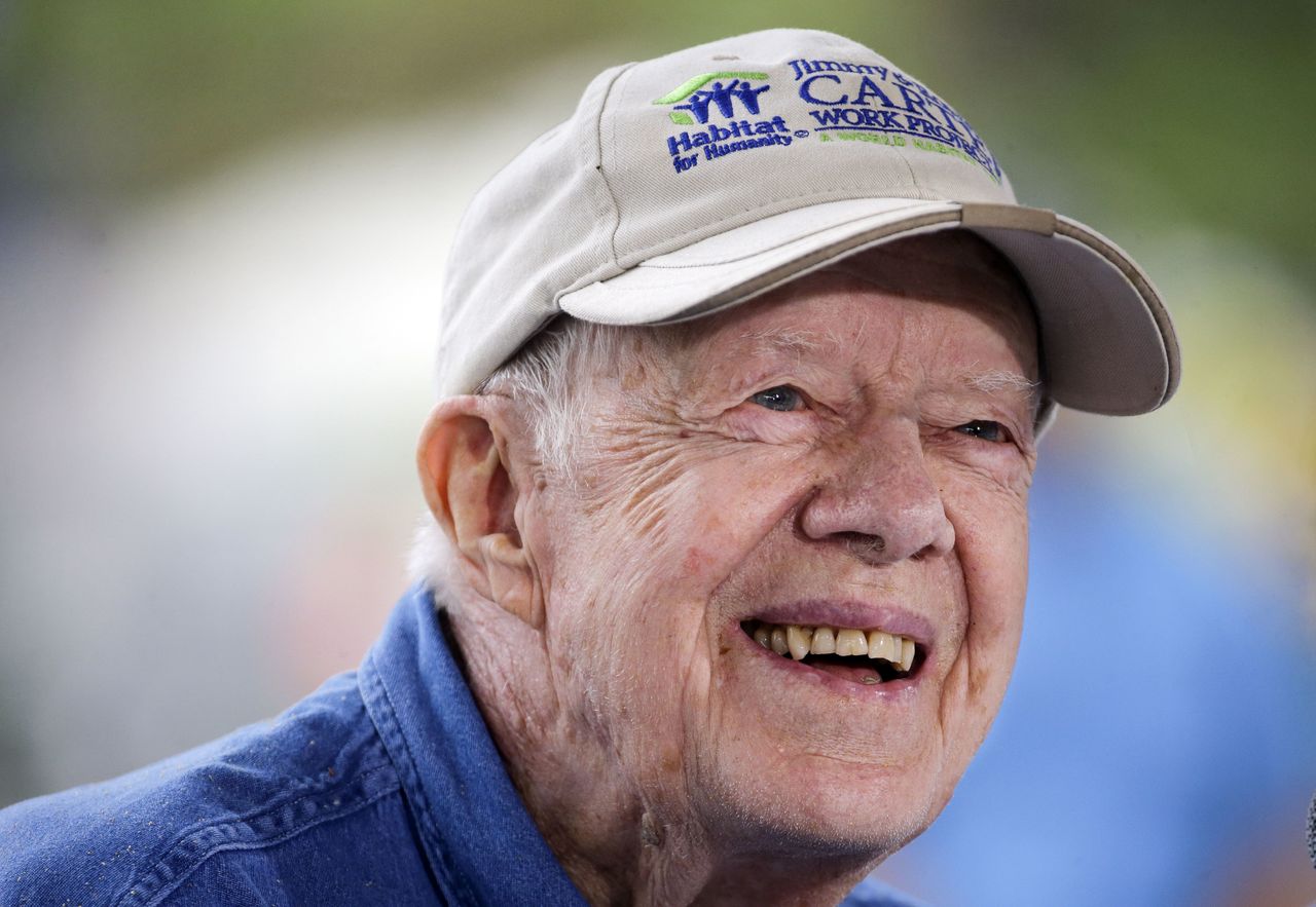 In a Nov. 2, 2015, photo, former President Jimmy Carter answers questions during a news conference at a Habitat for Humanity building site, in Memphis, Tennessee. The global human rights group The Elders said in a statement Wednesday that former President Carter is stepping away from his “front-line role” as a member of the organization.