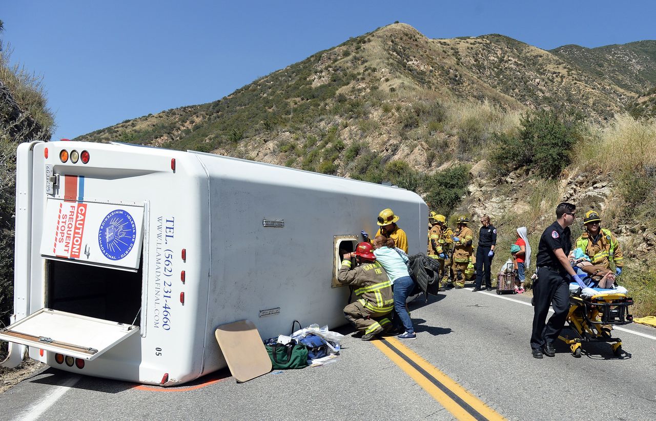 Approximately 20 people were injured, 4 with major injuries, after a small tour bus crashed and rolled over on highway 330 approximately 2 miles north of the 210 freeway Sunday.