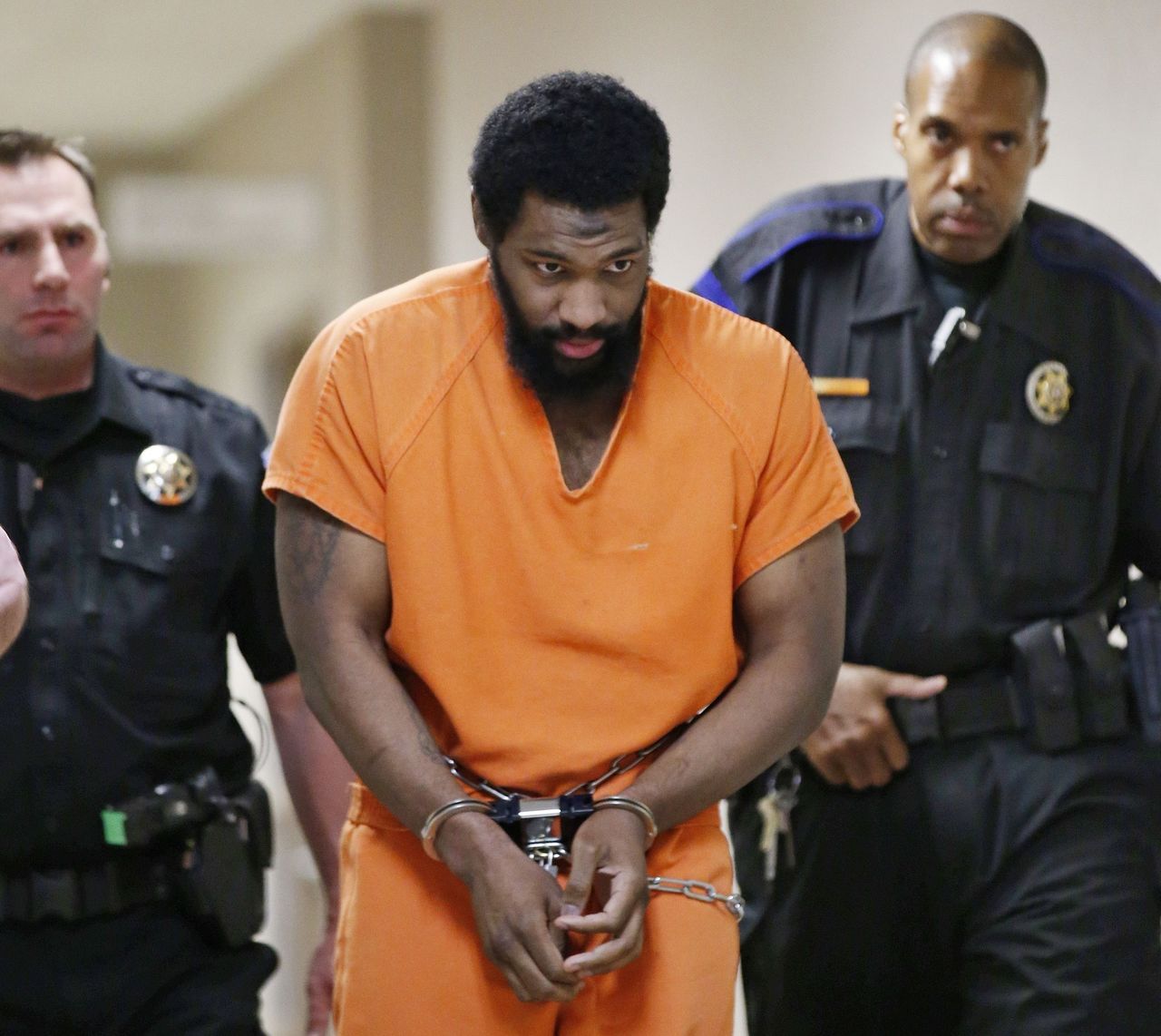 Alton Nolen is led from the courtroom following his preliminary hearing in Norman, Oklahoma, on Jan. 8.