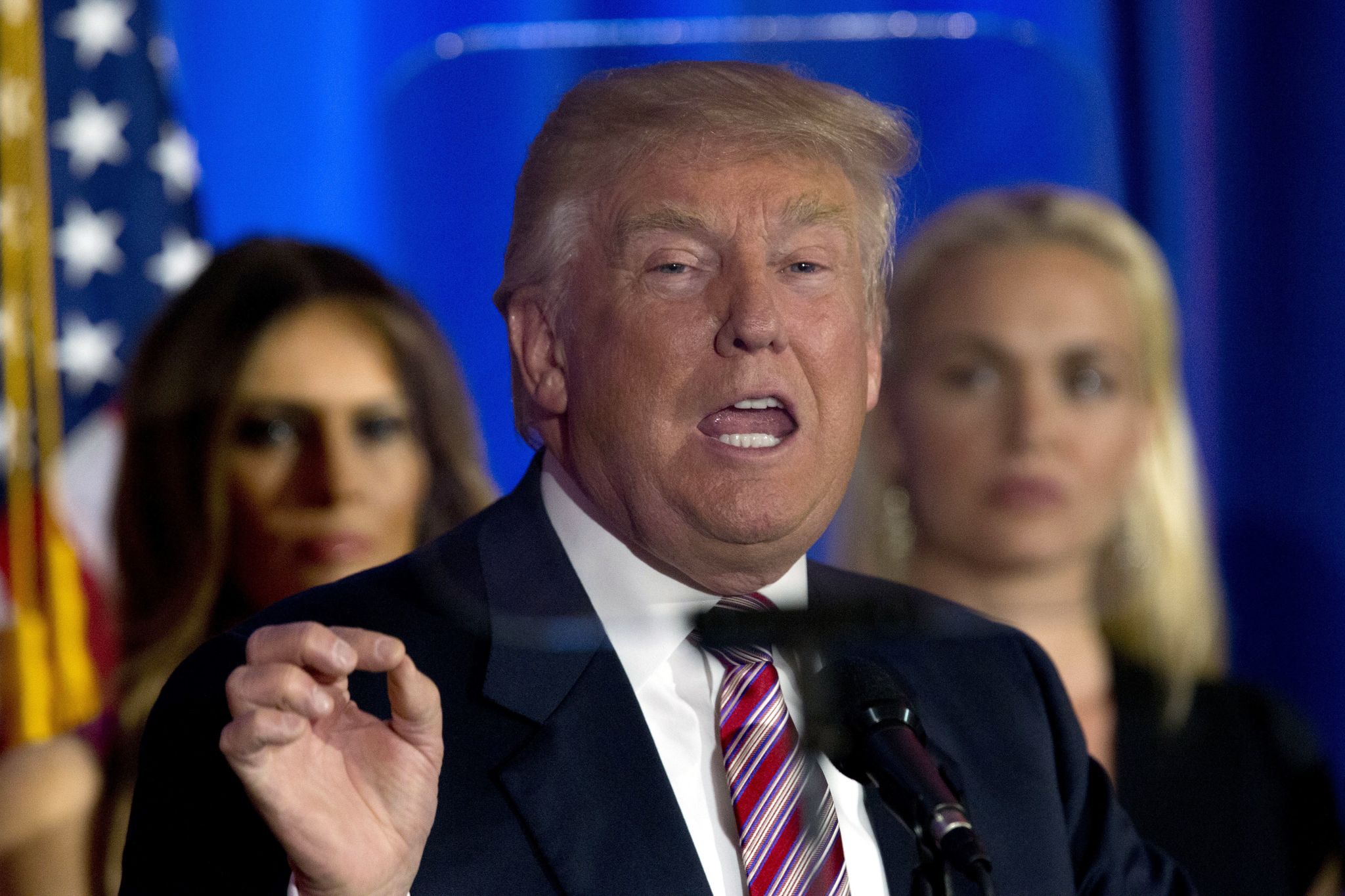 Republican presidential candidate Donald Trump is seen through the teleprompter as he speaks at the Trump National Golf Club Westchester on Tuesday in Briarcliff Manor, New York.