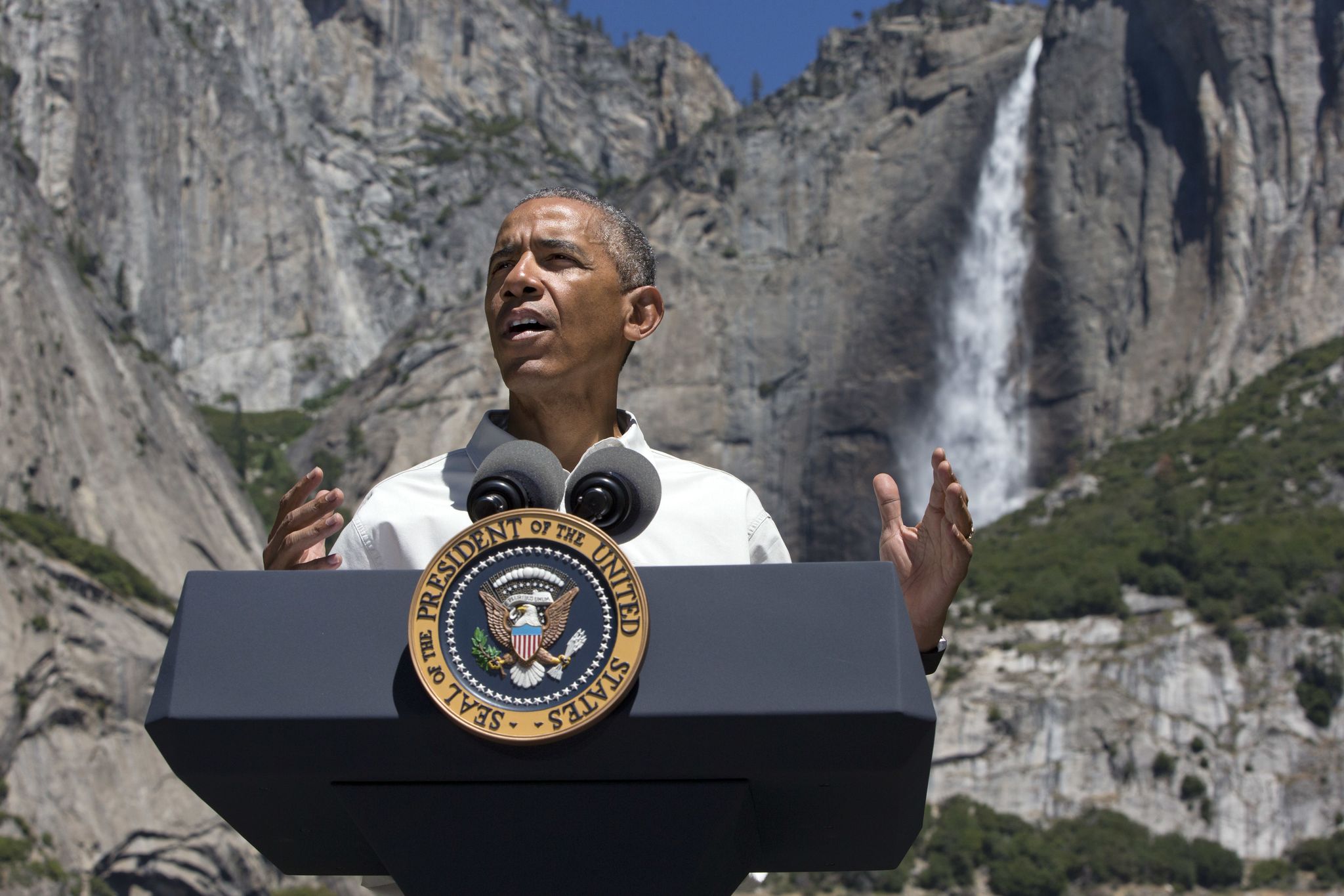 President Barack Obama speaks in front of Yosemite Falls at Yosemite National Park, California, on Saturday.