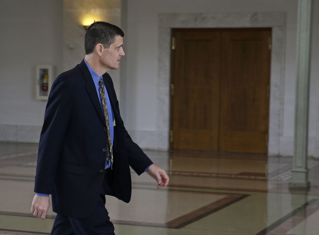 Washington State Auditor Troy Kelley leaves the federal courthouse during a court recess April 19 in Tacoma.