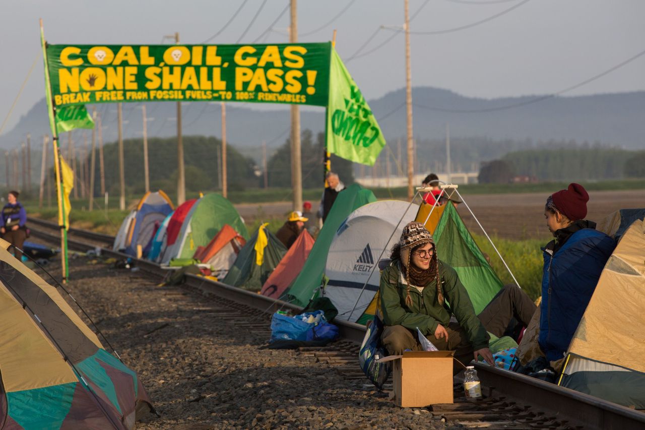 Tents line the tracks to the Tesoro refinery on March Point during a Break Free PNW blockade near the oil refineries in Anacortes on Saturday. The protests are part of a series of global actions calling on people to “break free” from dependence on fossil fuels.