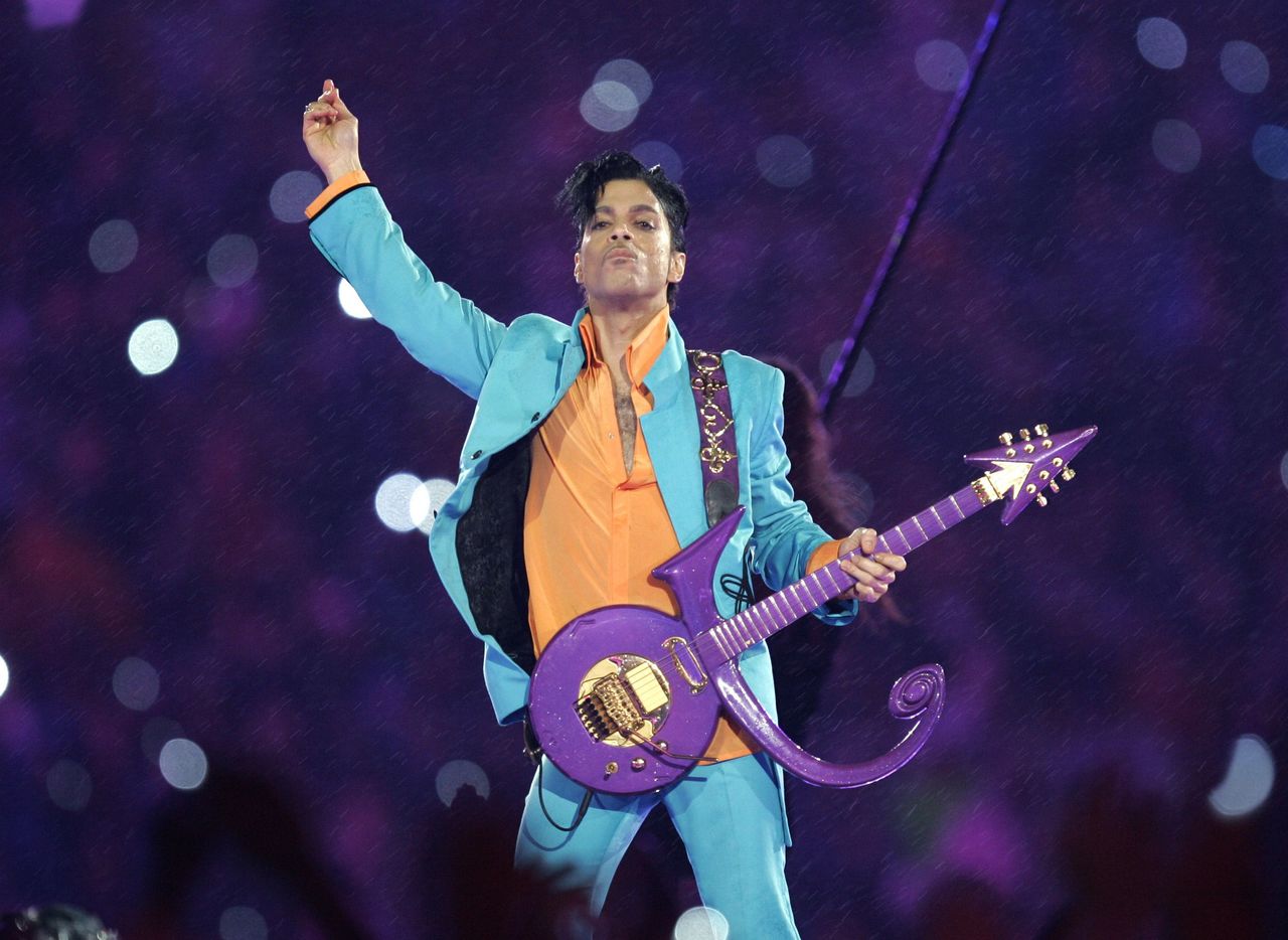 Prince performs during the halftime show at Super Bowl XLI at Dolphin Stadium in Miami, in 2007.