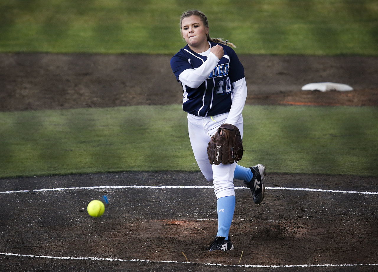 Meadowdale pitcher Lauren Dent delivers a pitch during the 3A District 1 championship game against Everett on Thursday at Phil Johnson Fields in Everett.
