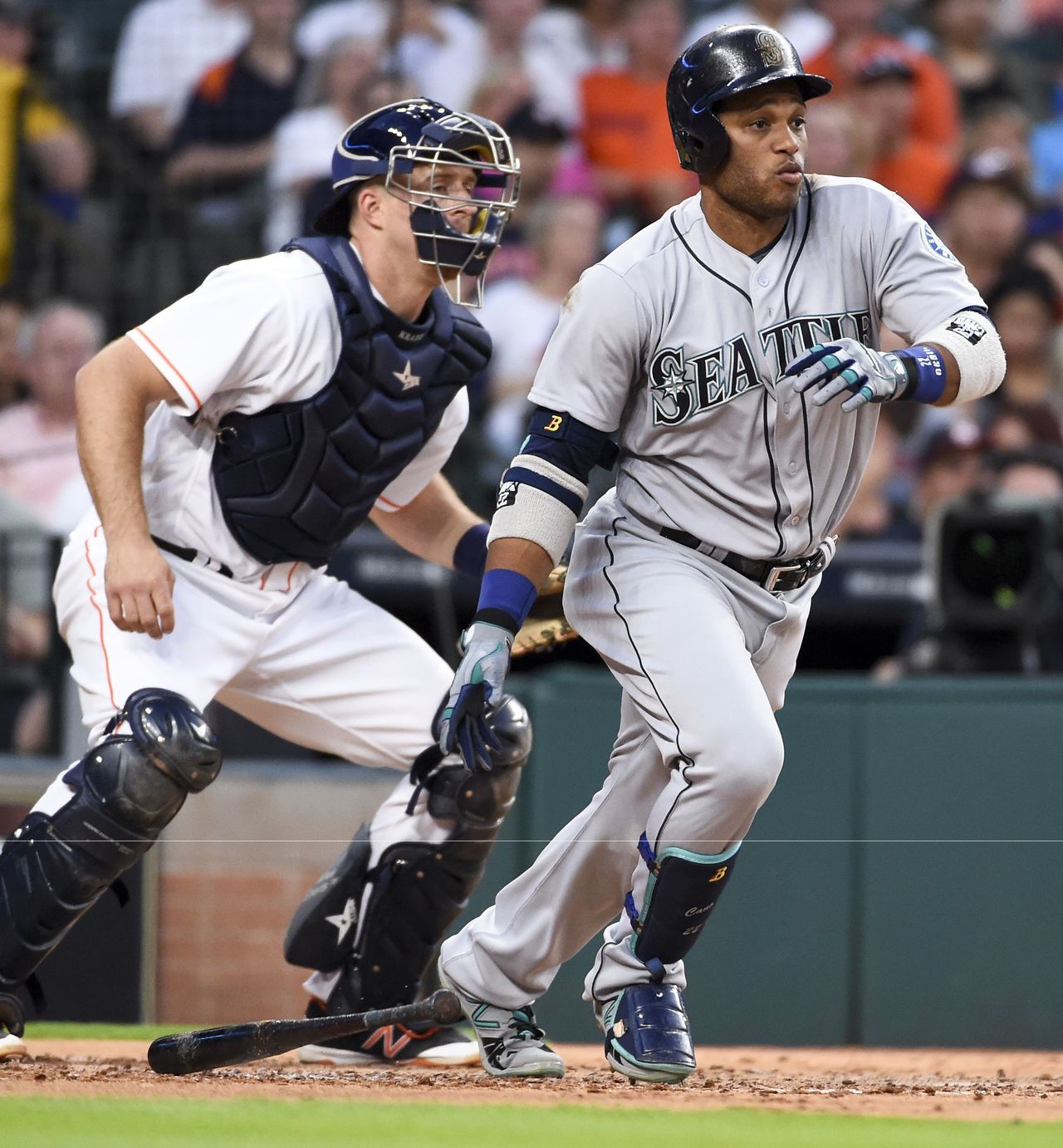 The Mariners’ Robinson Cano hits an RBI single in the third inning of a game against the Astros on Thursday in Houston.