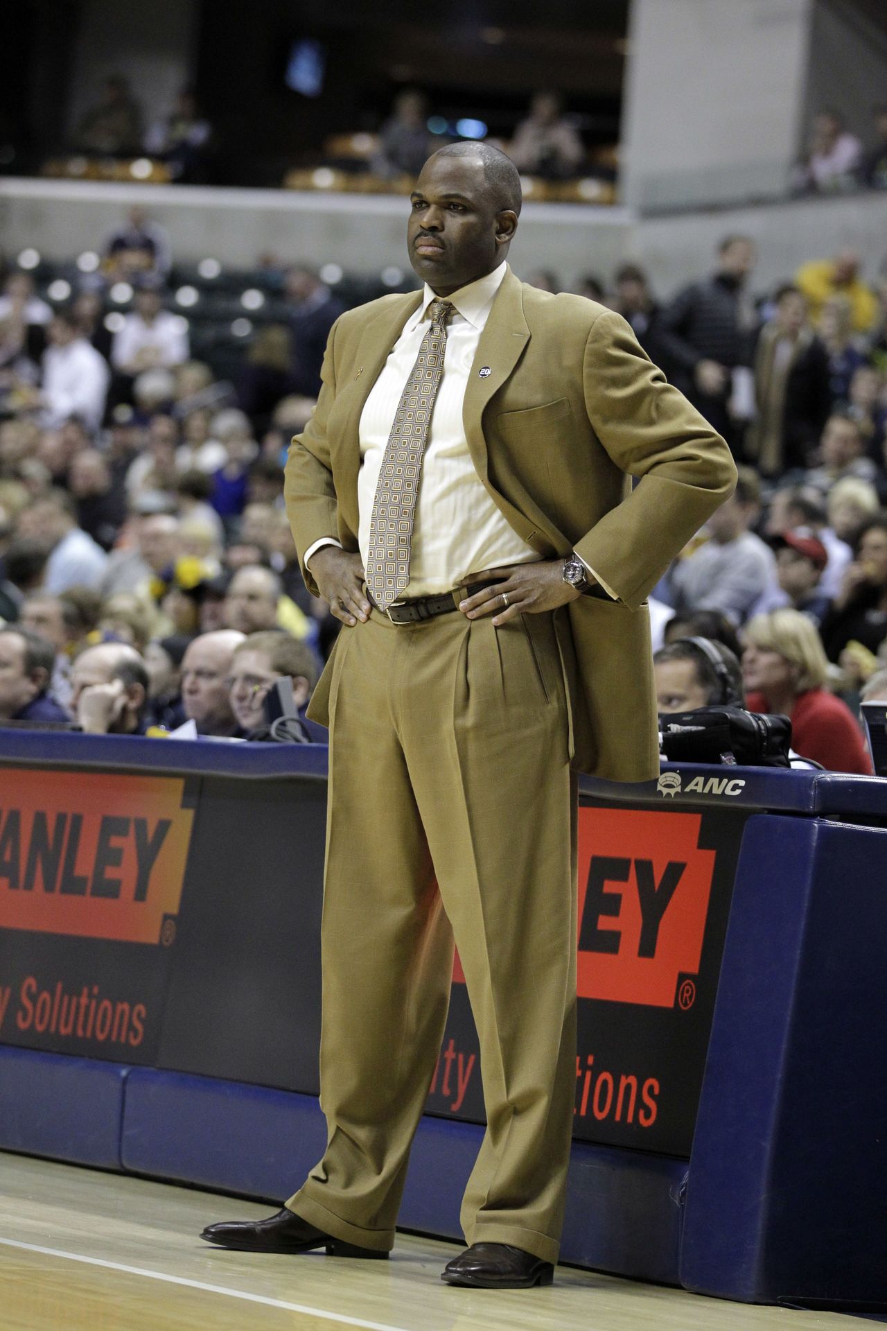 In this Feb. 4, 2011, photo, then-Portland Trail Blazers head coach Nate McMillan looks on against the Indiana Pacers in the first half of an NBA basketball game in Indianapolis.