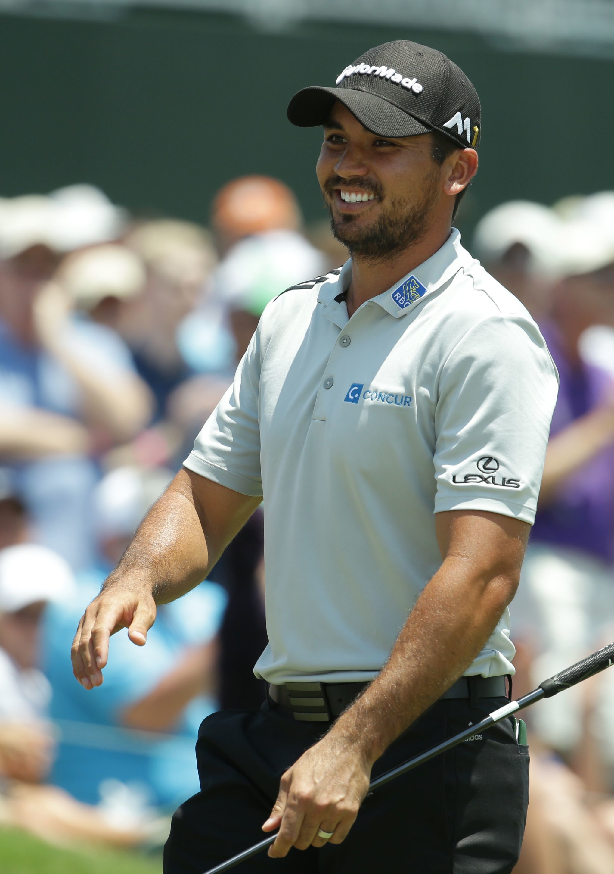 Jason Day of Australia smiles after finishing his record-tying round Thursday at The Players Championship golf tournament in Ponte Vedra Beach, Florida.