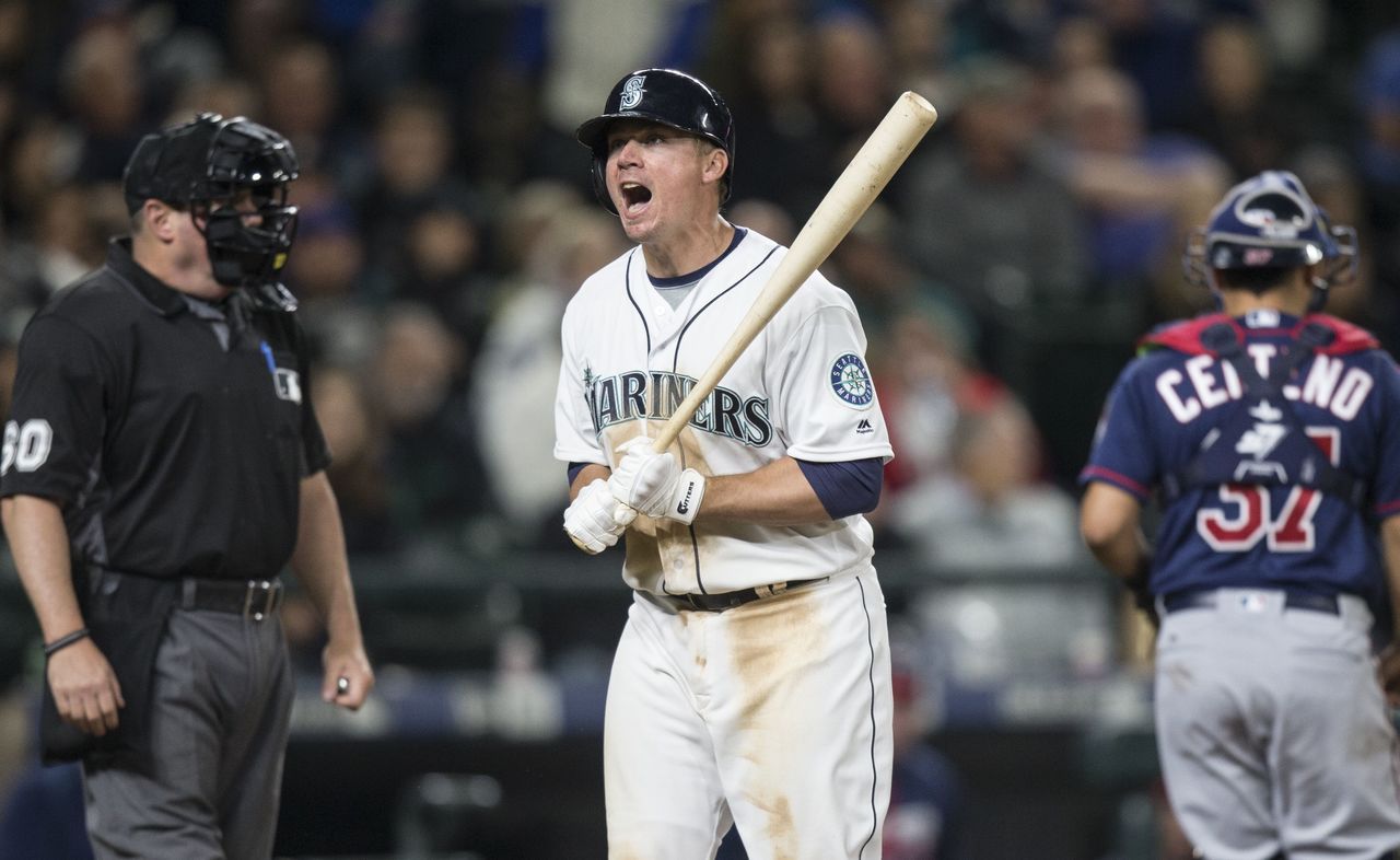 The Mariners’ Steve Clevenger reacts after striking out in the seventh inning of Saturday’s game against the Twins.