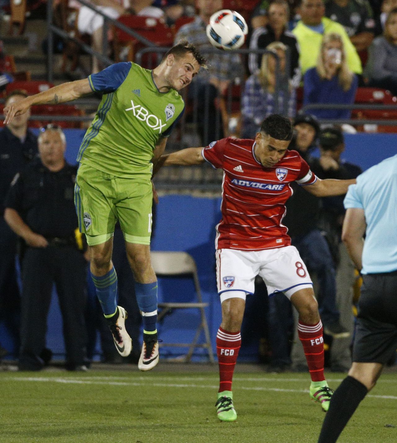 Sounders forward Jordan Morris (left) heads the ball over FC Dallas midfielder Victor Ulloa (8) during the second half of an MLS match on May 14 in Frisco, Texas.
