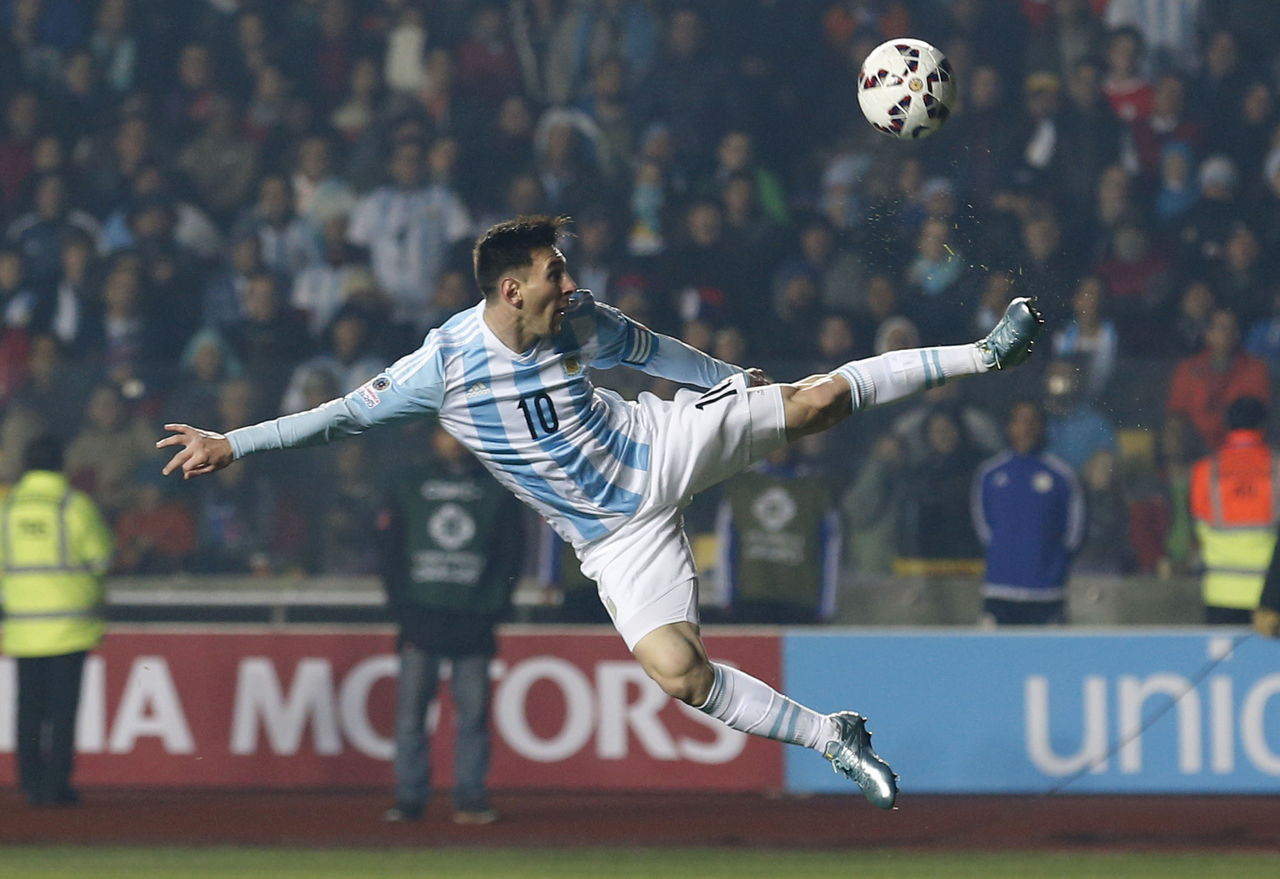 Argentina’s Lionel Messi kicks the ball during a match against Paraguay on June 30, 2015. Argentina will face Bolivia in a Copa America match on June 14 in Seattle, but Messi’s status is questionable due to injury.