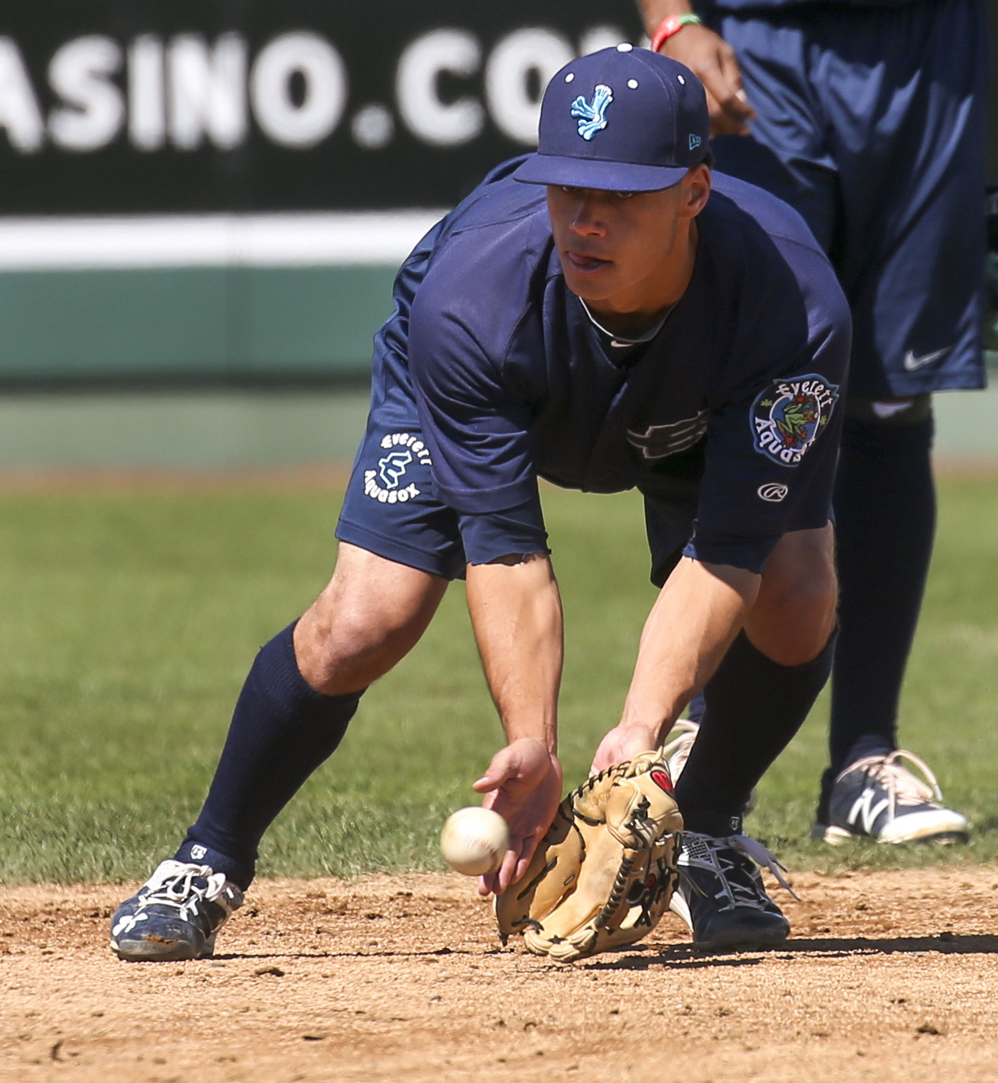 The AquaSox’s Bryson Brigman fields a grounder during a practice Thursday afternoon at Everett Memorial Stadium.