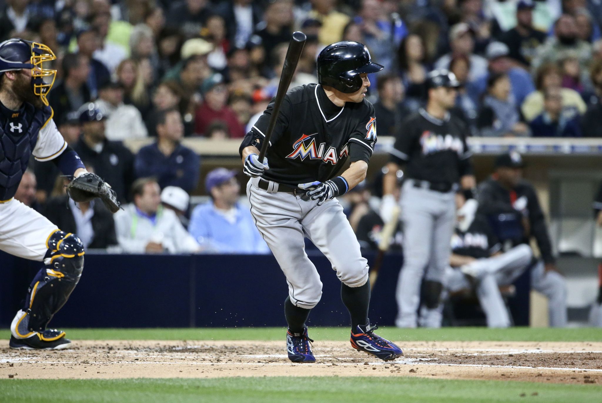 Ichiro Suzuki of the Miami Marlins watches his line drive fall in for a base hit during Monday night’s game against the San Diego Padres. Suzuki had three hits in the game to raise his season average to .350.
