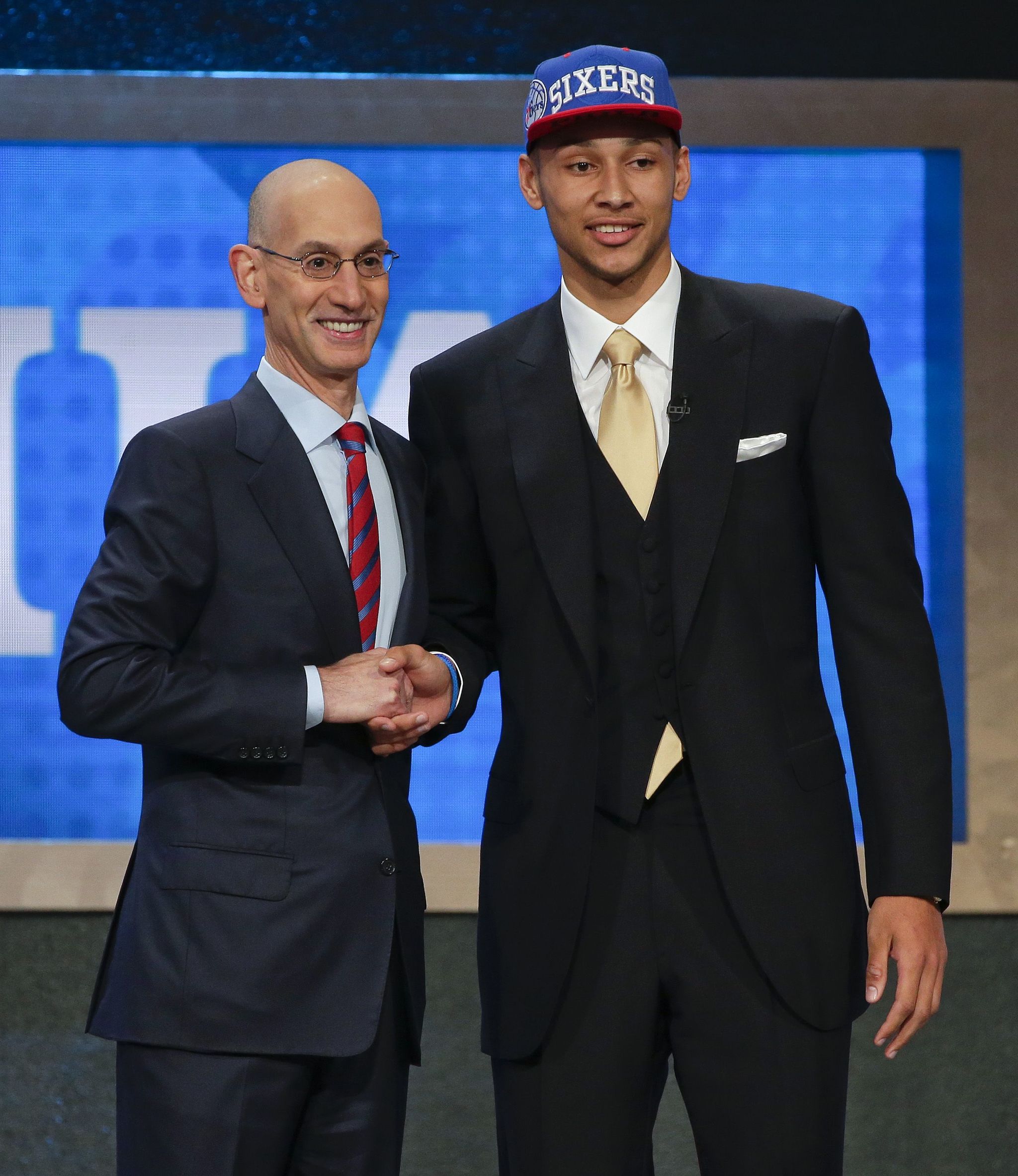 Ben Simmons poses with NBA Commissioner Adam Silver after being selected as the top overall pick by the Philadelphia 76ers during the NBA draft Thursday in New York.