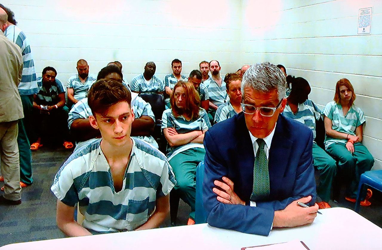 Mukilteo shooting suspect Allen Ivanov makes his first appearance at Snohomish County Court by video feed Monday. Ivanov, 19, is being investigated on two counts of first-degree murder and one count of domestic violence aggravated first-degree murder after four teens were shot and three died — including his ex-girlfriend — at a house party in Mukilteo on Saturday. He was ordered by the judge to be held with out bail and to have no contact with the victims’ families. (Genna Martin/seattlepi.com)
