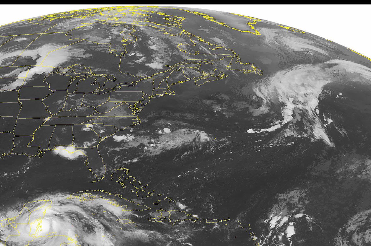 Hurricane Earl (lower left), bypasses the U.S. and begins to make landfall over Belize on Thursday. (NOAA/Weather Underground)