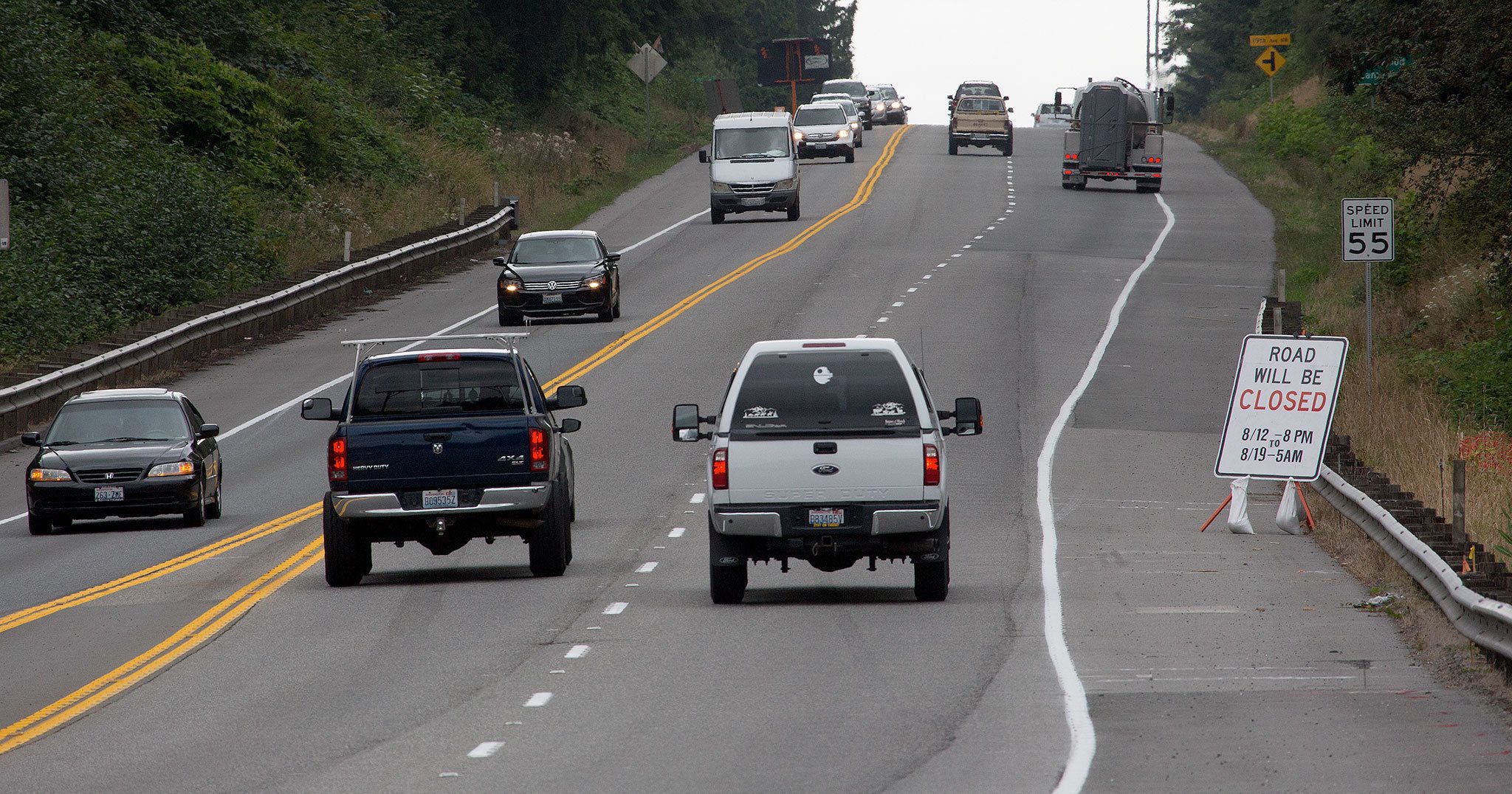 Motorists travel along Highway 532 just west of I-5 on Tuesday, Aug. 9, 2016 in Stanwood, Wa. The main route to Stanwood and Camano Island, is scheduled to close Aug. 12 for a week to replace a fish culvert on Secret Creek. (Andy Bronson / The Herald)