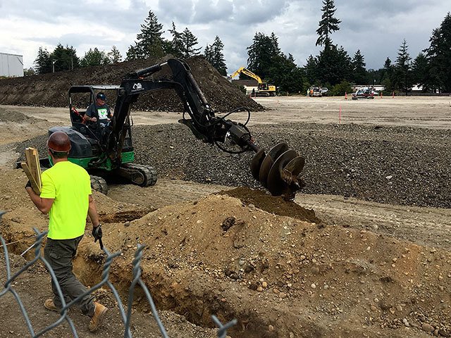 Publicly traded CarMax is building one of its first used car dealerships in the Puget Sound region in Lynnwood. The lot is expected to include 580 parking stalls, including 402 for sales. (Jim Davis / HBJ)