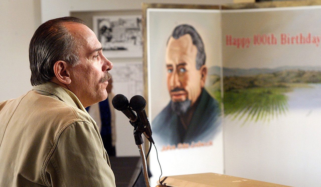 In this Feb. 27, 2002, photo, Thomas Steinbeck speaks to a crowd at the National Steinbeck Center in Salinas, California, to celebrate what would have been the 100th birthday of his father, author John Steinbeck. Thomas Steinbeck, the eldest son of John Steinbeck and an author in his own right, died Thursday at his California home, the family said through a representative. He was 72. (Richard Green/The Californian, File)