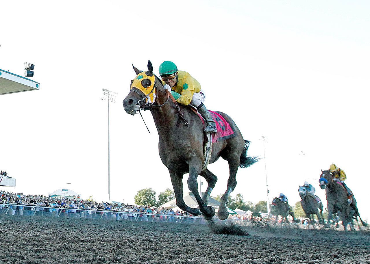 Point Piper and jockey Mario Gutierrez set a track and state record of 1:32.90 in the $200,000 Longacres Miles on Sunday at Emerald Downs in Auburn. (Emeralds Downs photo)