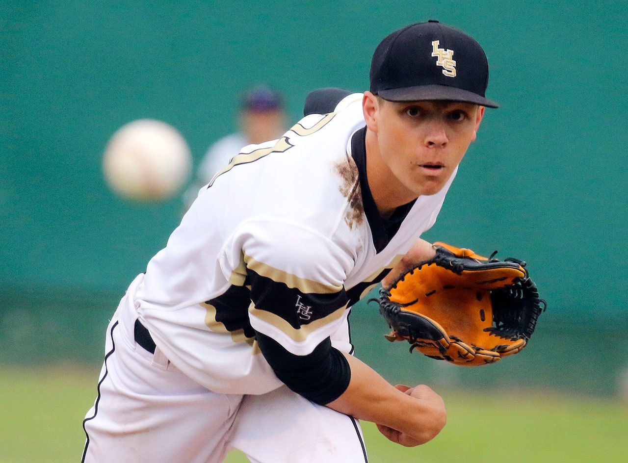 Lynnwood’s Brice Foster throws a pitch during a playoff game against Glacier Peak on May 16 at Everett Memorial Stadium. (Kevin Clark / The Herald)