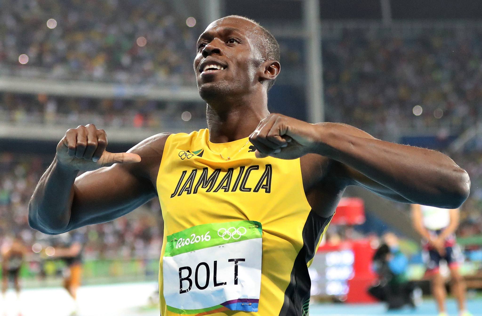 Jamaica’s Usain Bolt celebrates after crossing the line to win the gold medal in the men’s 200-meter final during the 2016 Summer Olympics on Thursday in Rio de Janeiro, Brazil. (AP Photo/Lee Jin-man)