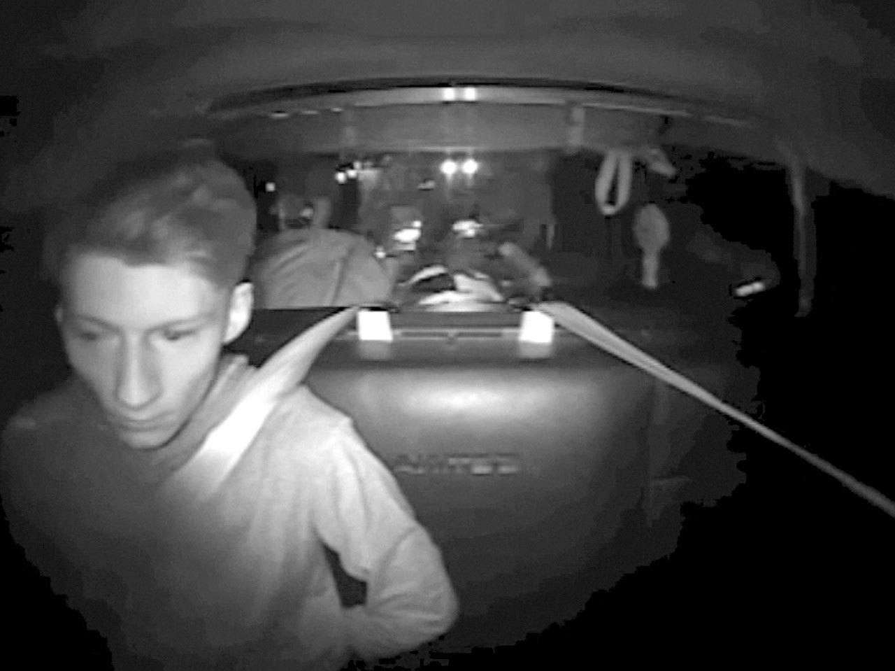 Allen Ivanov in the back of a patrol car, shortly after his arrest on I-5 in Lewis County on July 30. (Washington State Patrol)