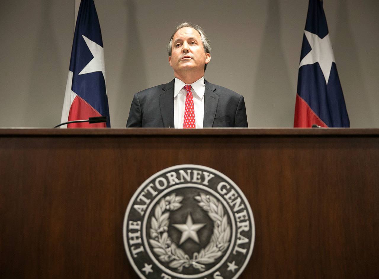 In this May 25 photo, Republican Texas Attorney General Ken Paxton announces Texas’ lawsuit to challenge President Obama’s transgender bathroom order during a news conference in Austin, Texas. (Jay Janner/Austin American-Statesman via AP)