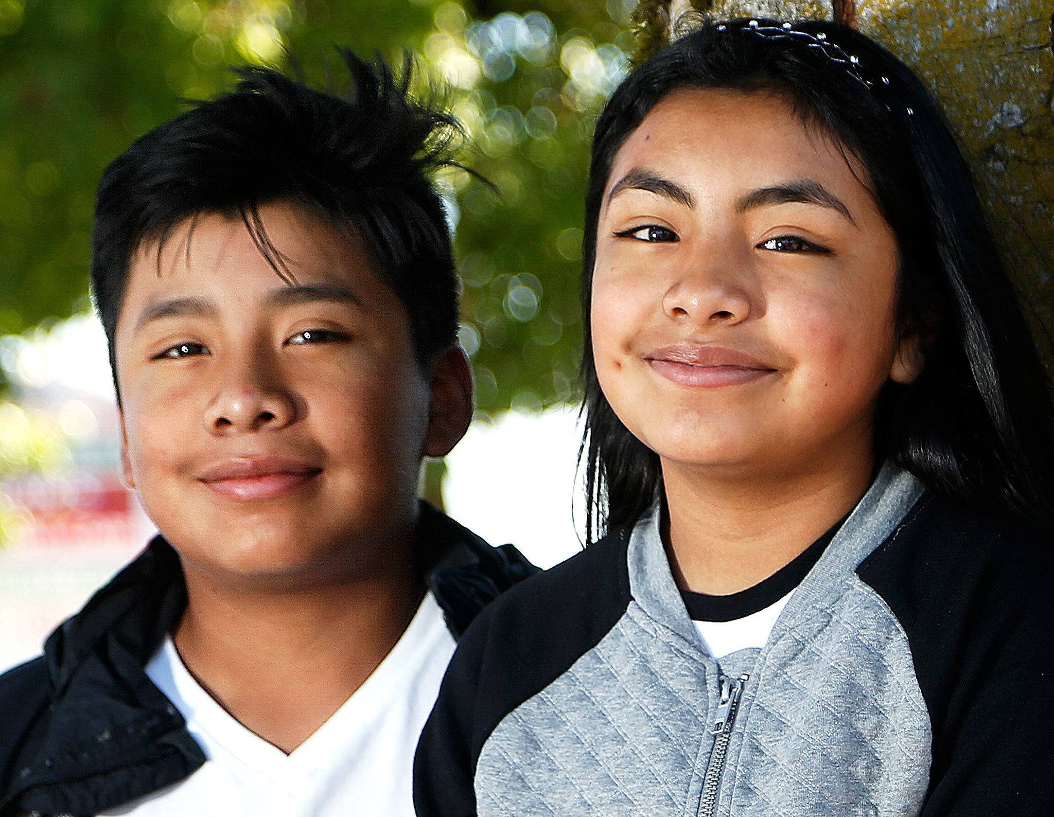 Griselda Guevara-Cruz was spending time this week with two of her nine siblings, 10-year-old Jayleen (right) and Melvin, 12, before her departure Friday from Everett to Washington, D.C. A graduate of Mariner High School, Whitman College, and the University of Texas, Guevara-Cruz, 27, has been accepted for a year-long graduate fellowship with the Congressional Hispanic Caucus Institute. (Dan Bates/The Herald)