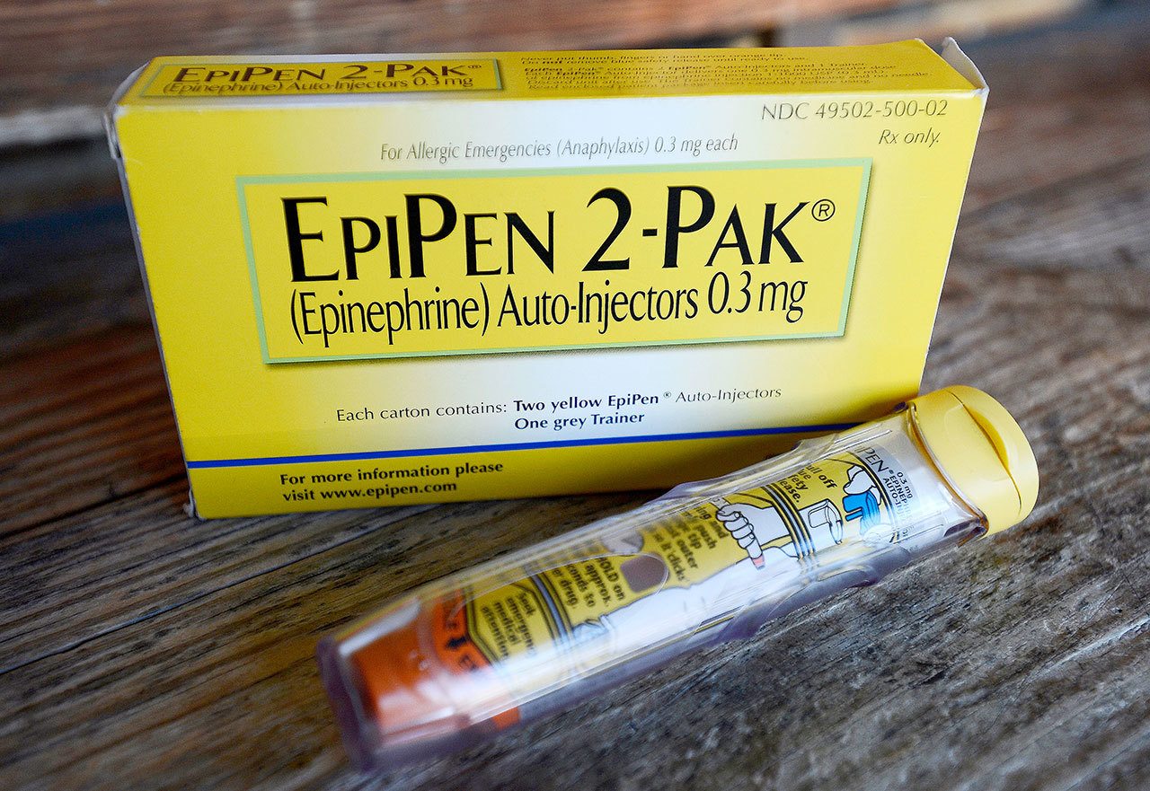 An EpiPen epinephrine auto-injector, a Mylan product. (AP Photo/Mark Zaleski)