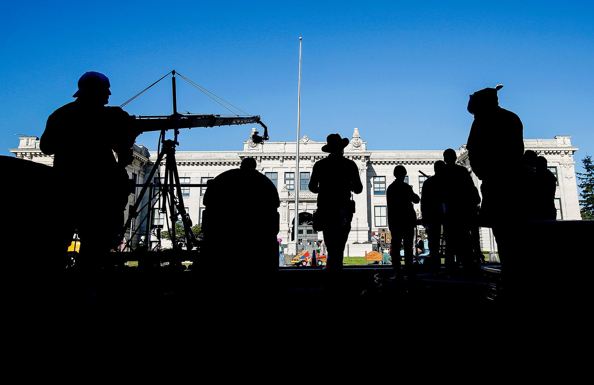 A film crew descends upon Everett High School on Wednesday morning with a large cast of characters performing as middle school kids for a commercial on Fruity Pebbles. (Dan Bates/The Herald)