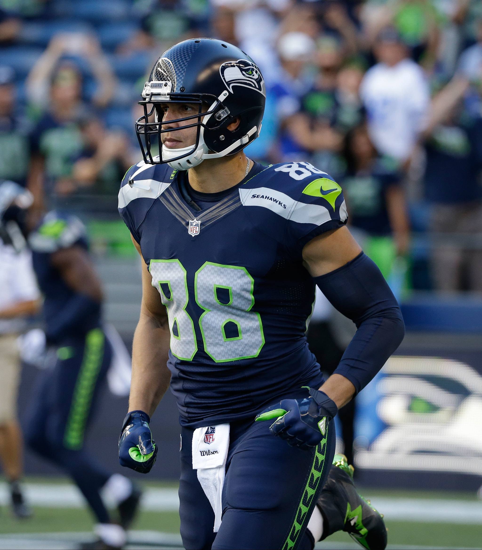 Seahawks tight end Jimmy Graham runs on the field during warmups before a preseason game against the Cowboys on Thursday in Seattle. (AP Photo/Elaine Thompson)