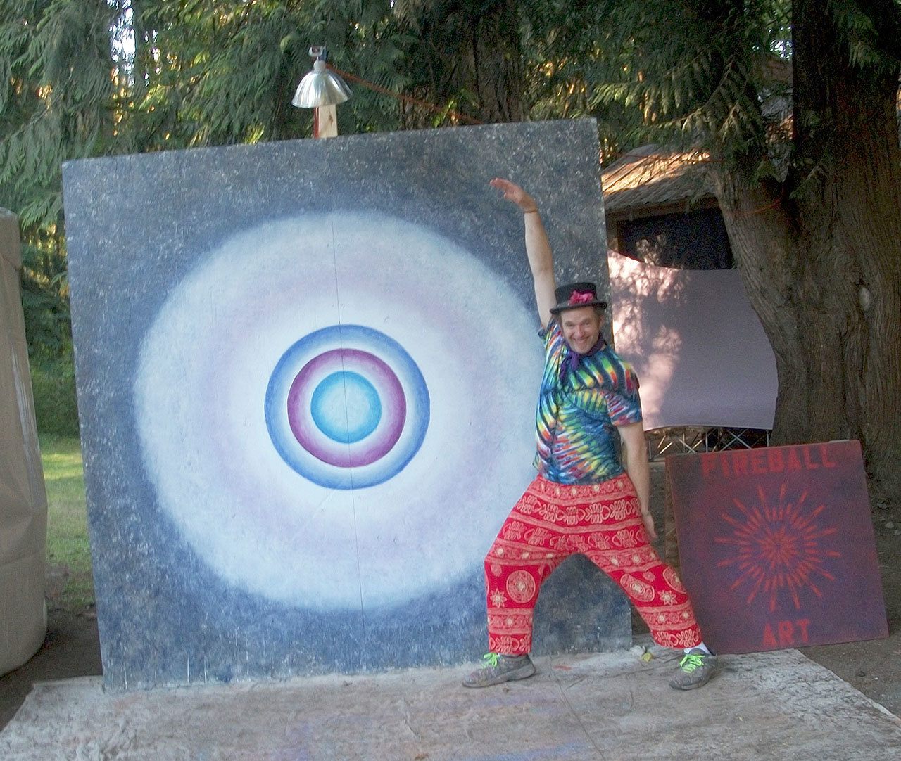 ”Fireball”​ ​Bill Ball​, 49, of Mukilteo, ​performance paints​ ​at Cascadia NW Festival in Granite Falls.​ This week he is at Burning Man.​ (Photo by Michelle Dietz)