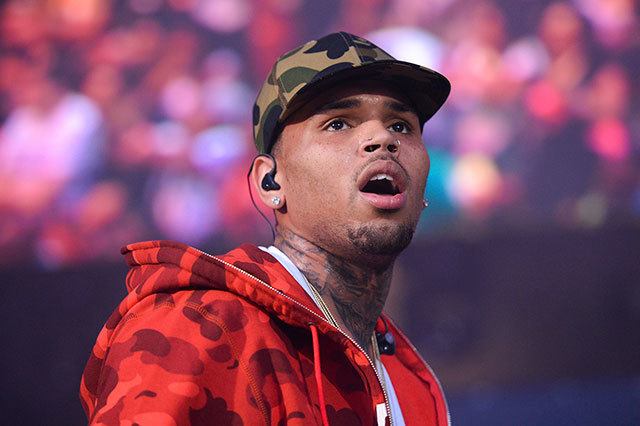 In this June 7, 2015, photo, rapper Chris Brown performs at the 2015 Hot 97 Summer Jam at MetLife Stadium in East Rutherford, New Jersey. Authorities said officers responded to singer Brown’s Los Angeles home early Tuesday, after a woman called police seeking assistance. (Photo by Scott Roth/Invision/AP, File)