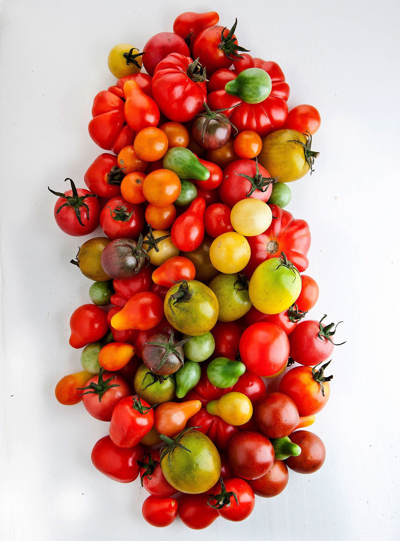 Cherry tomatoes can play multiple roles beyond the salad bowl. (Bill Hogan / Chicago Tribune)