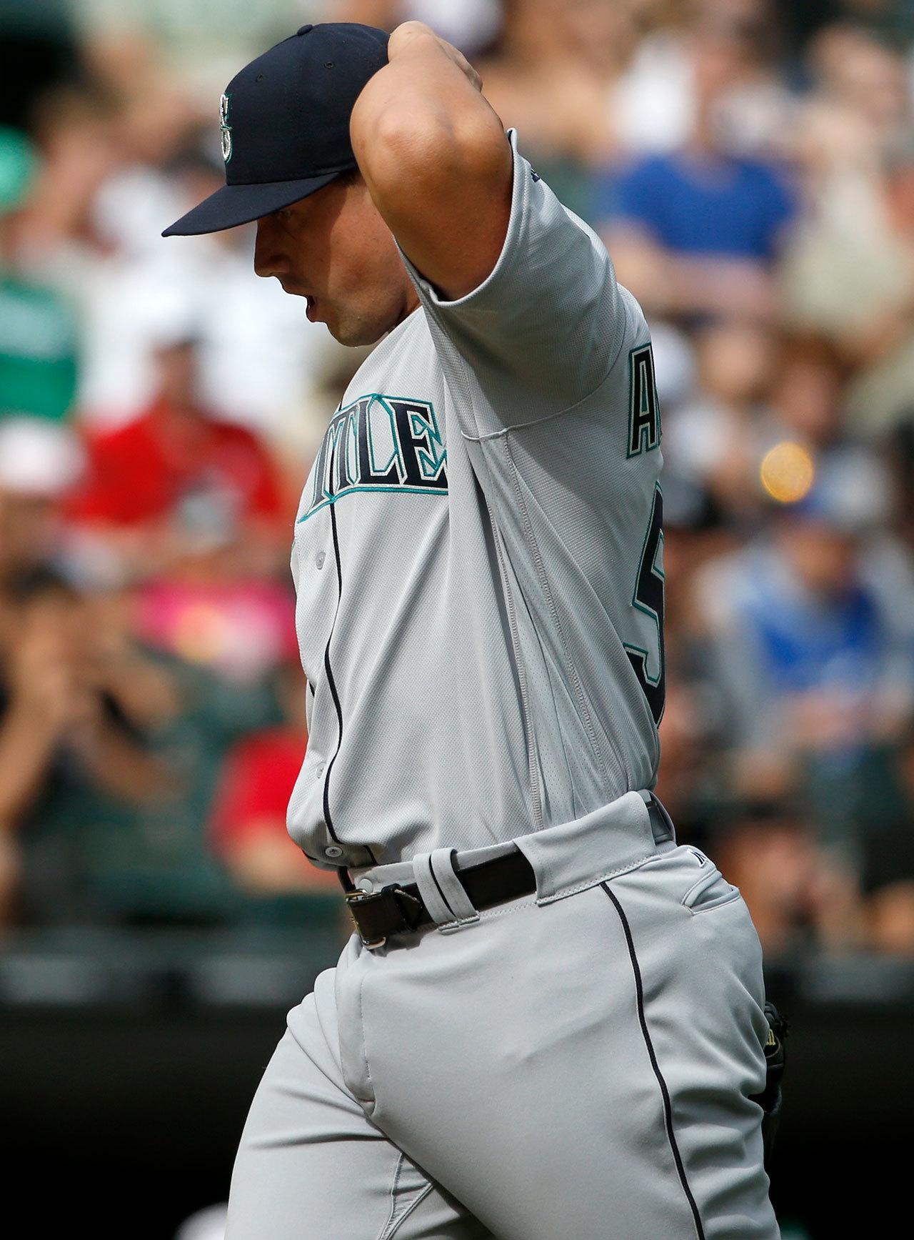 Seattle Mariners’ relief pitcher Dan Altavilla walks to the dugout after making his major-league debut in the eighth inning Saturday’s game in Chicago. (AP Photo/Nam Y. Huh)