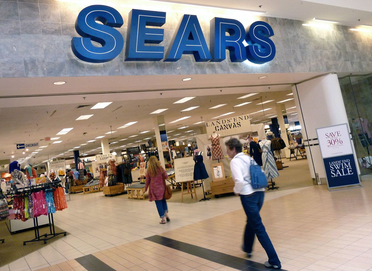 Shoppers walk into Sears store in Peabody, Massachusetts, in 2012.