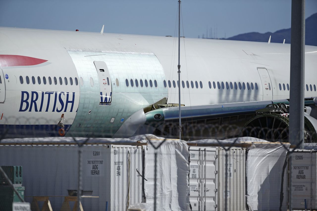 A British Airways Boeing 777 undergoes repairs at McCarran International Airport in Las Vegas on Monday.