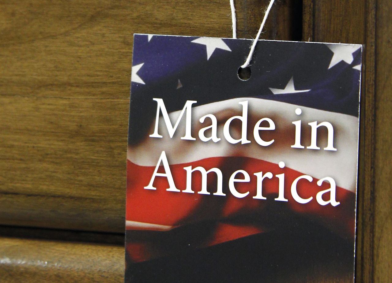 A “Made in America” tag hangs on a chest of drawers at a furniture factory in Lincolnton, North Carolina.