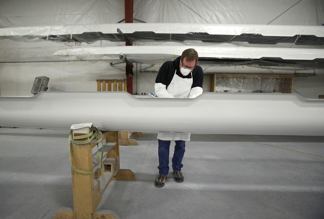 At Pocock Racing Shells in Everett, Eric Carpenter works on the finish of a shell. He is a post-finisher. His job is to take boats out of the mold, in “the rough” and do all the finish work on them.